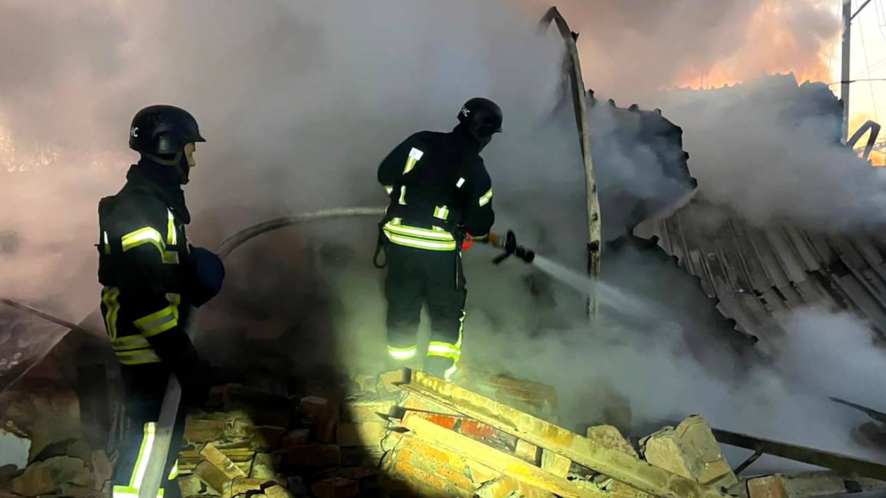 In this handout photograph taken and released by the Ukrainian Emergency Service on November 28, 2024, Ukrainian rescuers work to extinguish a fire at an energy infrastructure facility following a missile attack in Lutsk, Volyn region, amid the Russian invasion of Ukraine. More than a million Ukrainians were left without power in freezing cold temperatures on November 28, 2024 after a massive nationwide Russian missile and drone attack. (Photo by Handout / UKRAINIAN EMERGENCY SERVICE / AFP) / RESTRICTED TO EDITORIAL USE - MANDATORY CREDIT "AFP PHOTO / UKRAINIAN EMERGENCY SERVICE" - NO MARKETING NO ADVERTISING CAMPAIGNS - DISTRIBUTED AS A SERVICE TO CLIENTS