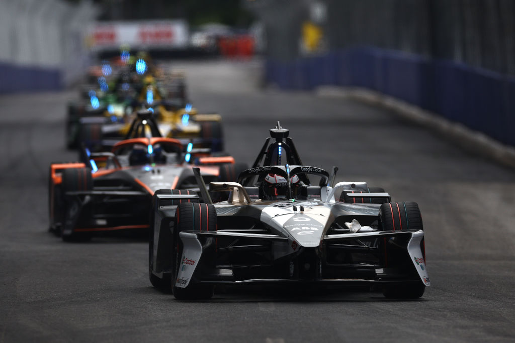 SAO PAULO, BRAZIL - DECEMBER 07: Mitch Evans of New Zealand driving the (9) Jaguar TCS Racing Jaguar I-TYPE 7 leads Sam Bird of Great Britain driving the NEOM McLaren Formula E Team Nissan e-4ORCE 05 at Sao Paulo Street Circuit on December 07, 2024 in Sao Paulo, Brazil. (Photo by Alastair Staley/LAT Images)