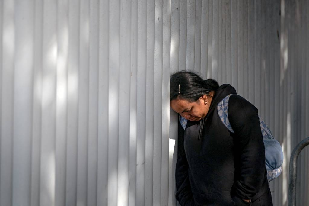 MEXICO-US-MIGRATION-BORDER FIM DA LINHA - Lágrimas: candidata a asilo lamenta a anulação de todas as audiências