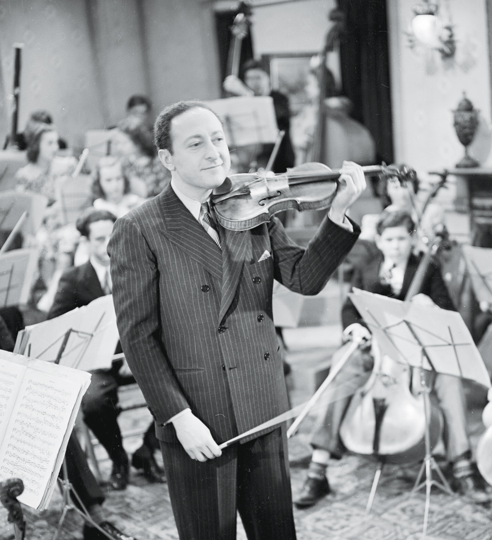 GettyImages-517330488.jpg VIRTUOSO - Jascha Heifetz e seu exemplar: tocando com o coração