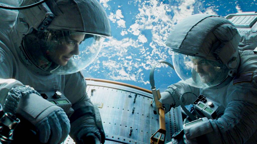 GRAVITY.jpg FICÇÃO - Sandra Bullock e George Clooney em Gravidade: perdidos no cosmo
