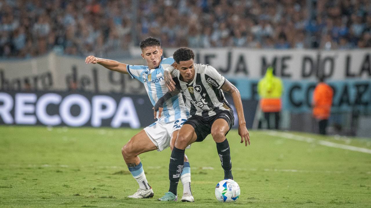 AVELLANEDA, ARGENTINA - 2025/02/20: (L-R) Gabriel Rojas of Racing Club with Newton Araújo da Costa Júnior of Botafogo in action during a Recopa Sudamericana 2025 match between Racing Club and Botafogo at Presidente Peron Stadium. Final Score: Racing Club 2:0 Botafogo.
