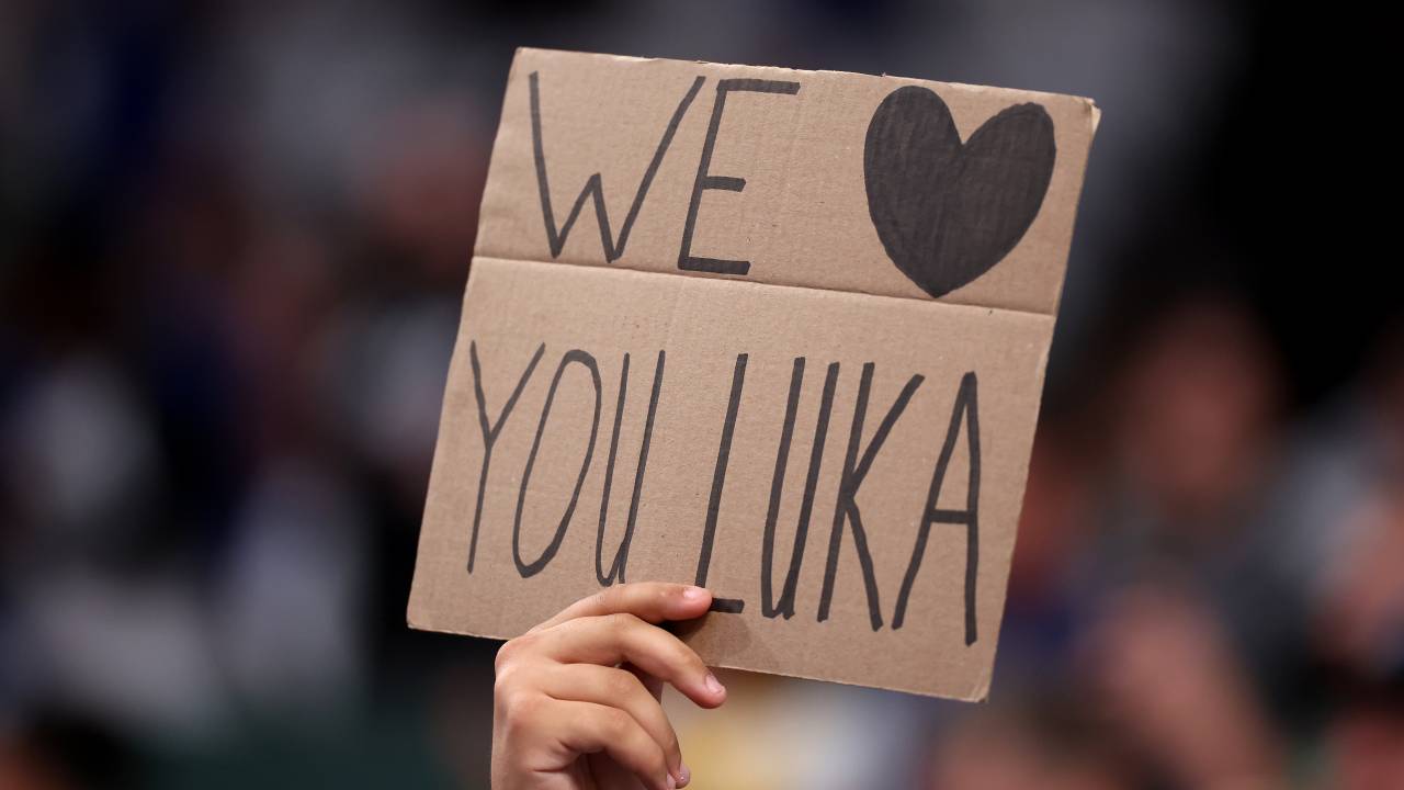 DALLAS, TEXAS - APRIL 09: A fan holds a sign in honor of Luka Doncic #77 of the Los Angeles Lakers before the game against the Dallas Mavericks at American Airlines Center on April 09, 2025 in Dallas, Texas. NOTE TO USER: User expressly acknowledges and agrees that, by downloading and or using this photograph, user is consenting to the terms and conditions of the Getty Images License Agreement.