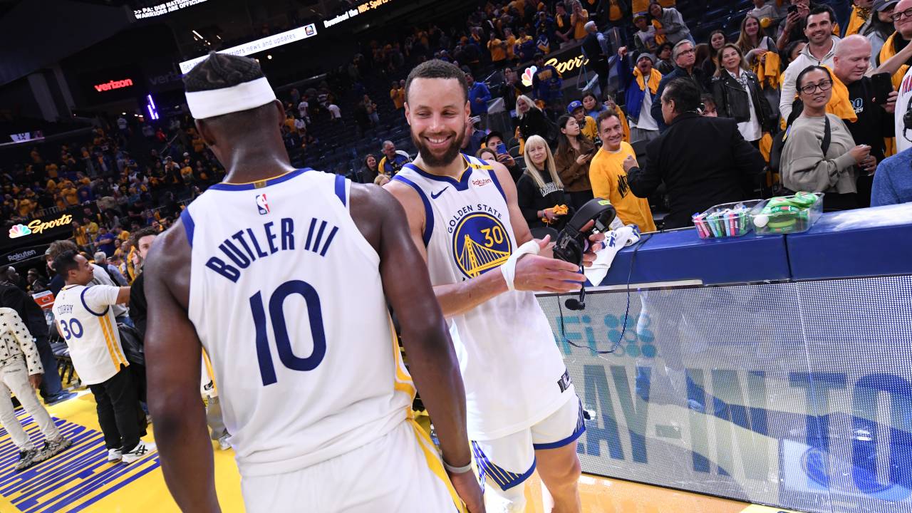 SAN FRANCISCO, CA - APRIL 15: Jimmy Butler #10 and Stephen Curry #30 of the Golden State Warriors celebrate after the game against the Memphis Grizzlies during the 2025 SoFi Play-In Tournament on April 15, 2025 at Chase Center in San Francisco, California. NOTE TO USER: User expressly acknowledges and agrees that, by downloading and or using this photograph, user is consenting to the terms and conditions of Getty Images License Agreement. Mandatory Copyright Notice: Copyright 2025 NBAE