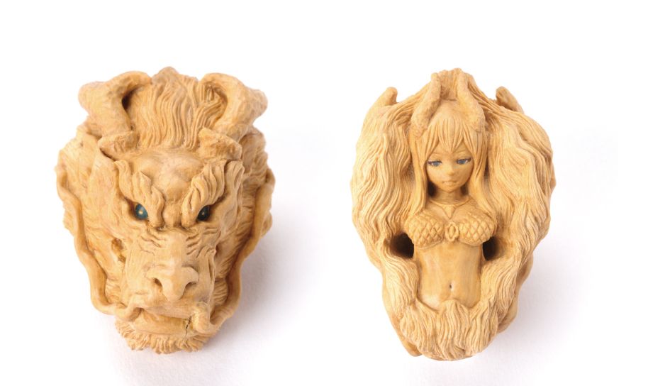 A obra de arte, frente e verso, é chamada de "Dragon x Queen". Ela é de autoria de Shinya Nagashima