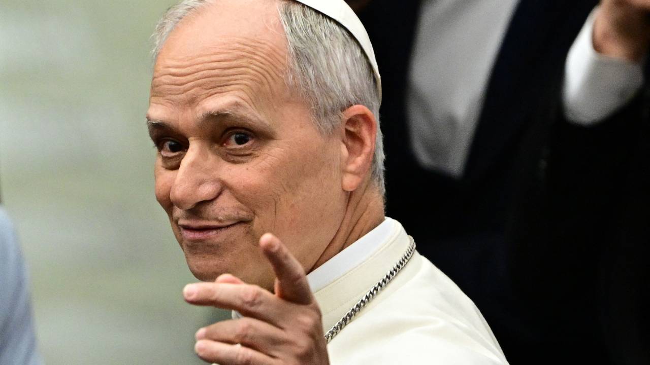 Pope Leo XIV gestures during an audience to representatives of the media, at Paul-VI hall in The Vatican, on May 12, 2025. (Photo by Tiziana FABI / AFP)