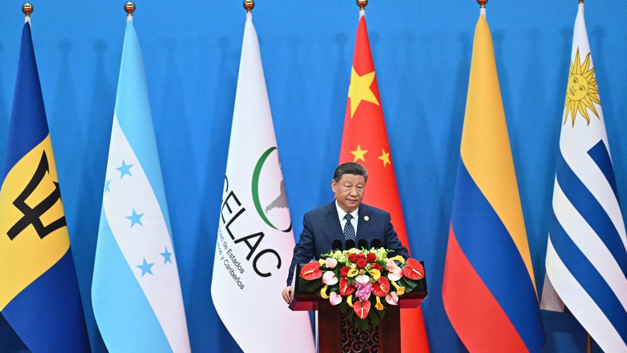 Chinas President Xi Jinping speaks during the opening ceremony of the Fourth Ministerial Meeting of the Forum of China and Community of Latin American and Caribbean States (CELAC), in Beijing on May 13, 2025. (Photo by Pedro PARDO / AFP)