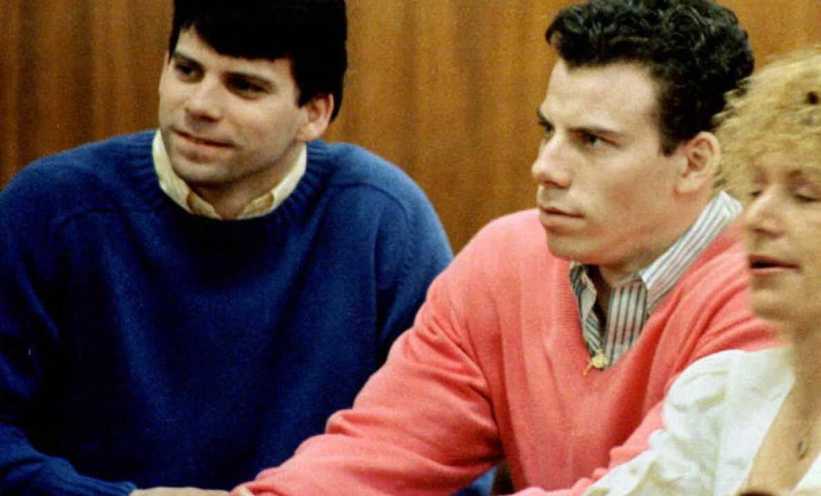 (FILES) (FILES) This 1992 file photo shows double murder defendants Erik (R) and Lyle Menendez (L) during a court appearance in Los Angeles, California. Lyle and Erik Menendez were resentenced May 13, 2025, for the murder of their parents in 1989, with a term that now opens the possibility of parole. A judge in Los Angeles said the men's term should be changed to one of 50 years to life, reducing their original sentence of life without the possibility of parole. (Photo by MIKE NELSON / AFP)