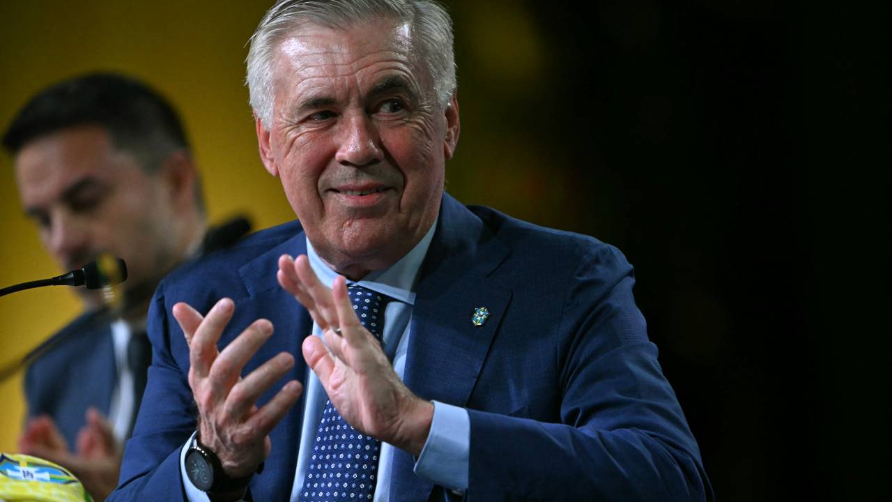 Brazil's football team new head coach, Italian Carlo Ancelotti, applauds during his official presentation at a hotel in Barra da Tijuca neighbourhood, Rio de Janeiro, Brazil, on May 26, 2025. (Photo by Mauro PIMENTEL / AFP)