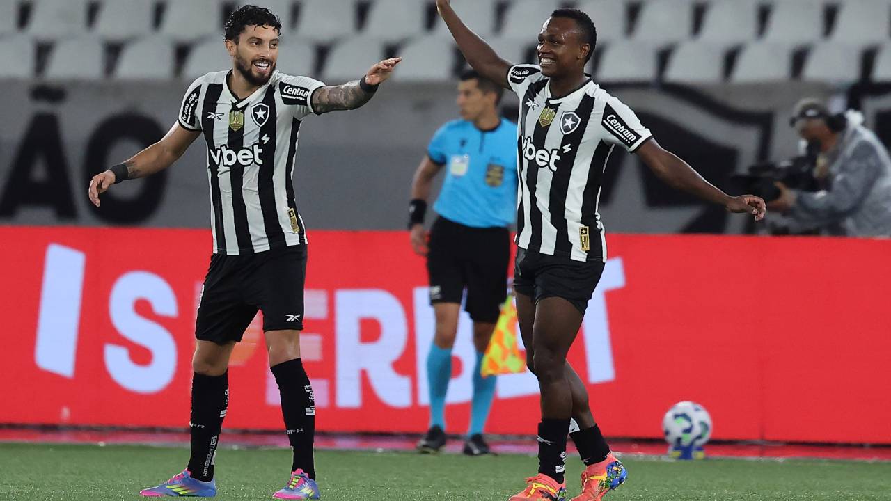 RIO DE JANEIRO, BRAZIL - MAY 11: Alex Telles (L) of Botafogo celebrates after scoring the fourth goal of his team with teammate Nathan Fernandes during the match between Botafogo and Internacional as part of Brasileirao 2025 at Estadio Olimpico Nilton Santos on May 11, 2025 in Rio de Janeiro, Brazil. (Photo by Wagner Meier/Getty Images)