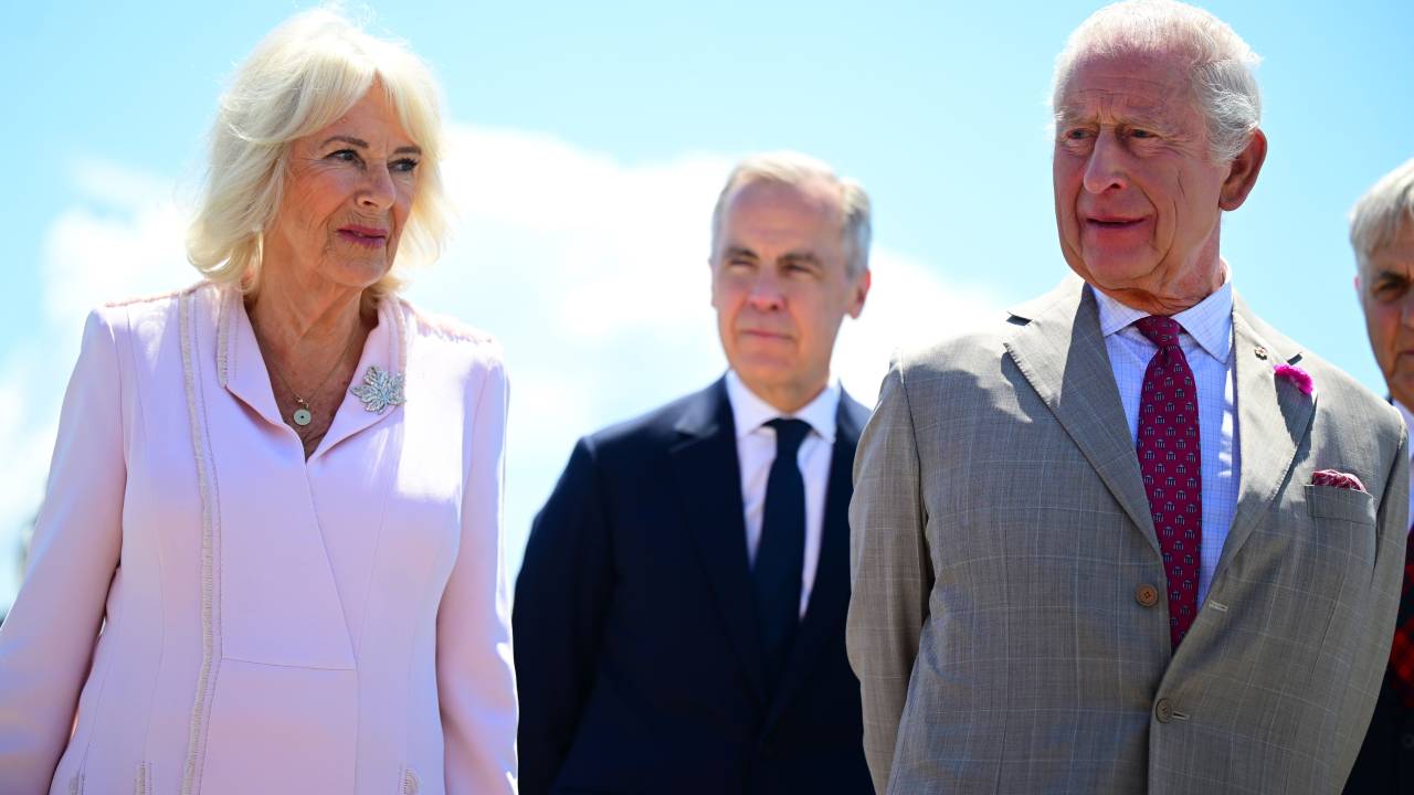 OTTAWA, CANADA - MAY 26: King Charles lll and Queen Camilla with Canadian Prime Minister Mark Carney upon their arrival at Ottawa Airport during an official visit to Canada on May 26, 2025 in Ottawa, Canada. It is The King's 20th and Queen's 5th tour of Canada, with their previous visit being in 2022. (Photo by Victoria Jones - Pool/Getty Images)