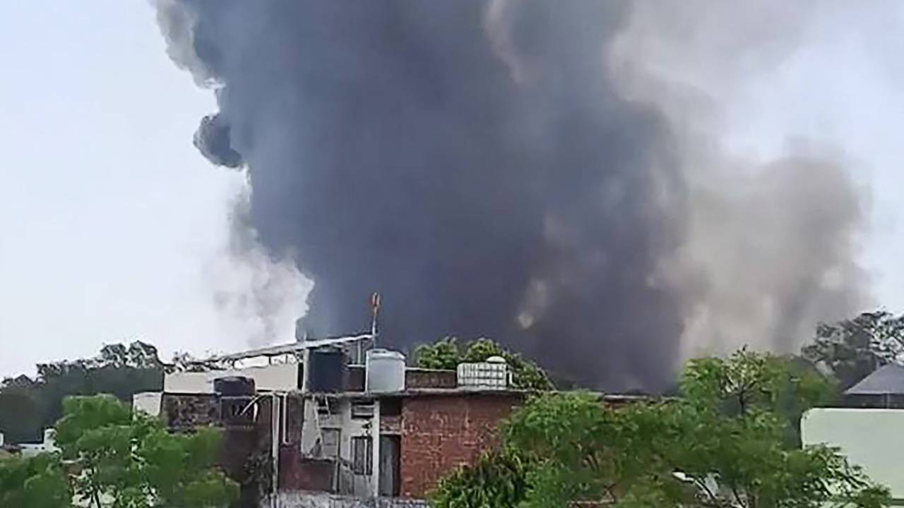 This frame grab from a video by @ashlovetea on June 12, 2025 made available on the Eurovision Social Newswire (ESN) platform via AFPTV shows a plume of smoke rising after Air India flight 171 crashed near the airport in Ahmedabad. The London-bound passenger plane crashed on June 12 in India's western city of Ahmedabad with 242 on board, aviation officials said in what the airline called a "tragic accident". (Photo by @ashlovetea / various sources / AFP) / -----EDITORS NOTE --- RESTRICTED TO EDITORIAL USE - MANDATORY CREDIT "AFP PHOTO /@ashlovetea/ESN via AFPTV " - NO MARKETING - NO ADVERTISING CAMPAIGNS - DISTRIBUTED AS A SERVICE TO CLIENTS - NO ARCHIVES
