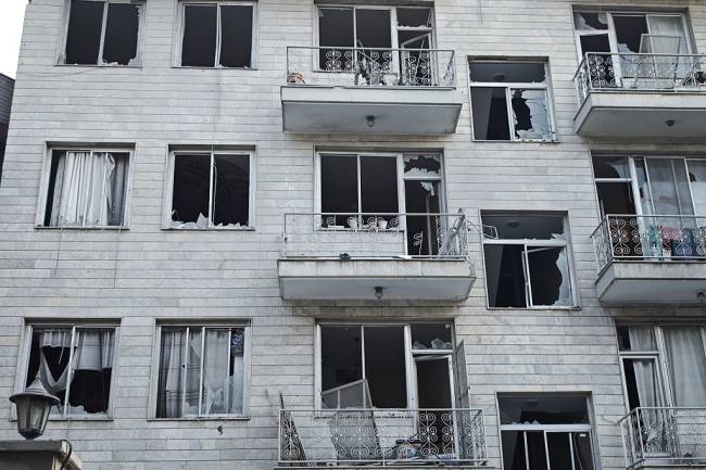 TEHRAN, IRAN - JUNE 13: Damage to buildings following Israeli airstrikes on June 13, 2025 in Tehran, Iran. Iran's three top military generals were killed in the attacks that also targeted nuclear and military facilities, according to published reports. Israel described the strikes as preemptive to keep Iran from obtaining nuclear weapons, the reports said. (Photo by Majid Saeedi/Getty Images)