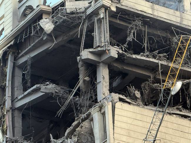 TEHRAN, IRAN - JUNE 13: A destroyed building is shown following a massive Israeli airstrike in the Kamranieh neighborhood on June 13, 2025 in Tehran, Iran. (Photo by Contributor#699095/Getty Images)