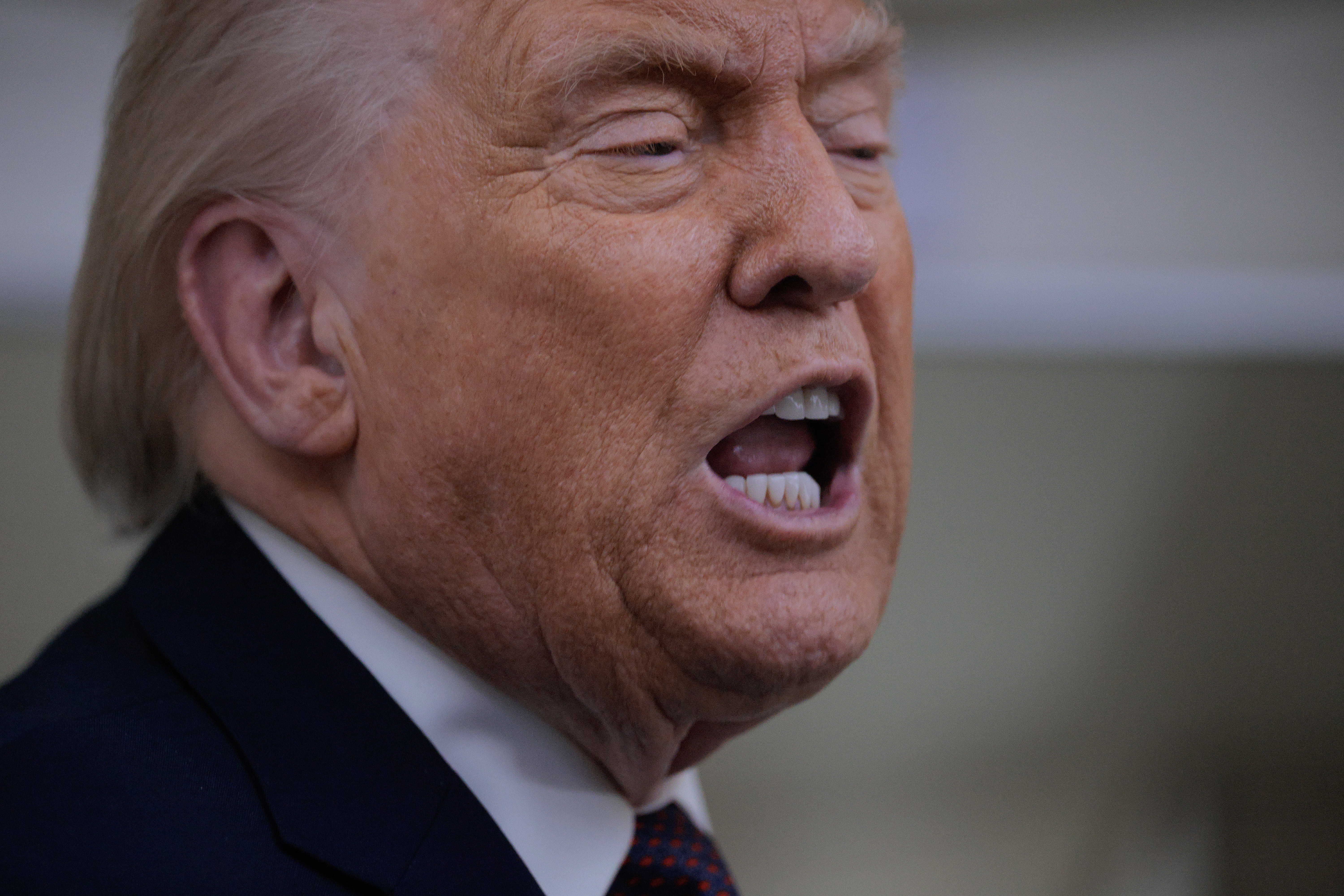 IN FLIGHT - JANUARY 22: U.S. President Donald Trump speaks to reporters on board Air Force One while flying in between Ireland and Washington as he returns from the World Economic Forum on January 22, 2026 at Joint Base Andrews, Maryland. Following a meeting with NATO Secretary General Mark Rutte, Trump announced a deal with European leaders on the semi-autonomous Danish territory of Greenland during the annual meeting of political and business leaders in Davos. (Photo by Chip Somodevilla/Getty Images)