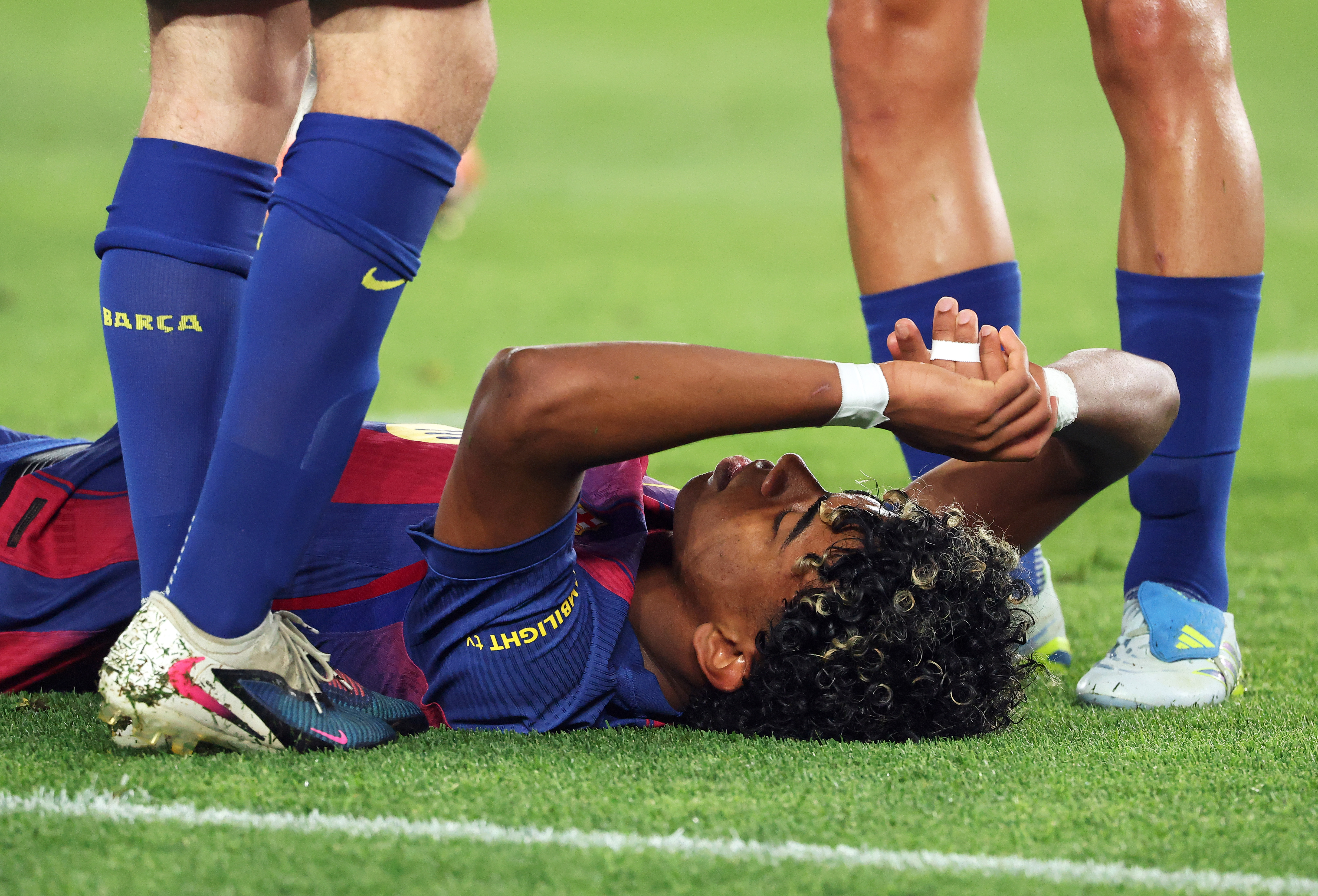 Lamine Yamal is injured after taking a penalty kick during the match between FC Barcelona and Real Club Celta de Vigo, corresponding to week 33 of LaLiga EA Sports, at the Spotify Camp Nou in Barcelona, Spain, on April 22, 2026. (Photo by Joan Valls/Urbanandsport/NurPhoto via Getty Images)