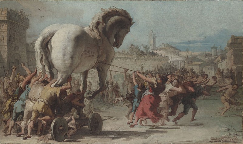 Multid&atilde;o de homens e mulheres puxando o Cavalo de Troia para dentro de uma cidade murada, com torres e edif&iacute;cios ao fundo